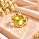Elegant Gold-Tone Green Dial Ring Watch with Clover Detail – Women’s Fashion Watch