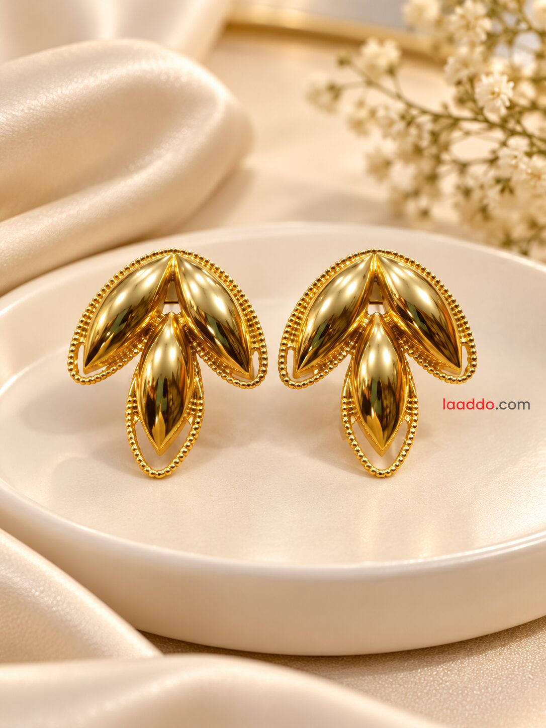 2026/10/1001800574.jpg Premium Golden Leaf Design Statement Earrings - Image 1