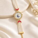 Elegant Pearl Strap Peacock Dial Women’s Bracelet Watch