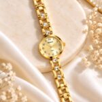 Elegant Gold Crystal Studded RENOS Women’s Bracelet Watch