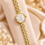 Elegant Gold Crystal RENOS Quartz Bracelet Watch for Women