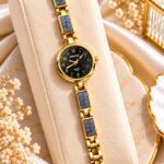 Elegant Black Dial Gold RENOS Marble Link Bracelet Watch