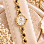 Elegant Gold Black Stone RENOS Quartz Bracelet Watch with 12-3-6-9 Dial
