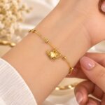 Elegant Gold Winged Heart Charm Bracelet | Dainty Beaded Chain Bracelet for Women