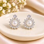 Elegant Pearl & Crystal Floral Stud Earrings – Silver Finish