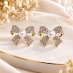 SEO Product Title: Gold-Tone Crystal Bow Pearl Stud Earrings for Women | Elegant Korean Fashion Jewellery – LAADDO.com