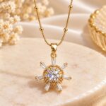 Gold Plated Crystal Starburst Pendant Necklace with Elegant Beaded Chain for Women